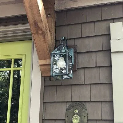 Michaela 1-Light Outdoor Wall Lantern Longshore Tides Fixture Finish: Dark Antique Copper - Shade Finish: Clear