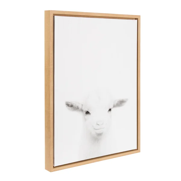 Kate and Laurel Sylvie Baby Goat Black and White Portrait Natural Framed Canvas Wall Art by Simon TE Tai