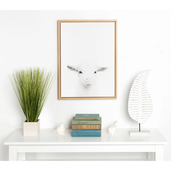 Kate and Laurel Sylvie Baby Goat Black and White Portrait Natural Framed Canvas Wall Art by Simon TE Tai