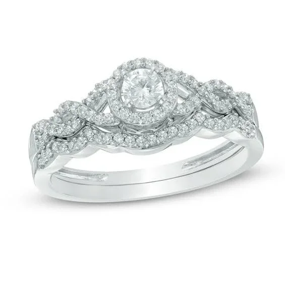 Zales 3/8 Ct. T.W. Diamond Frame Loose Braid Bridal Set in 10K White Gold